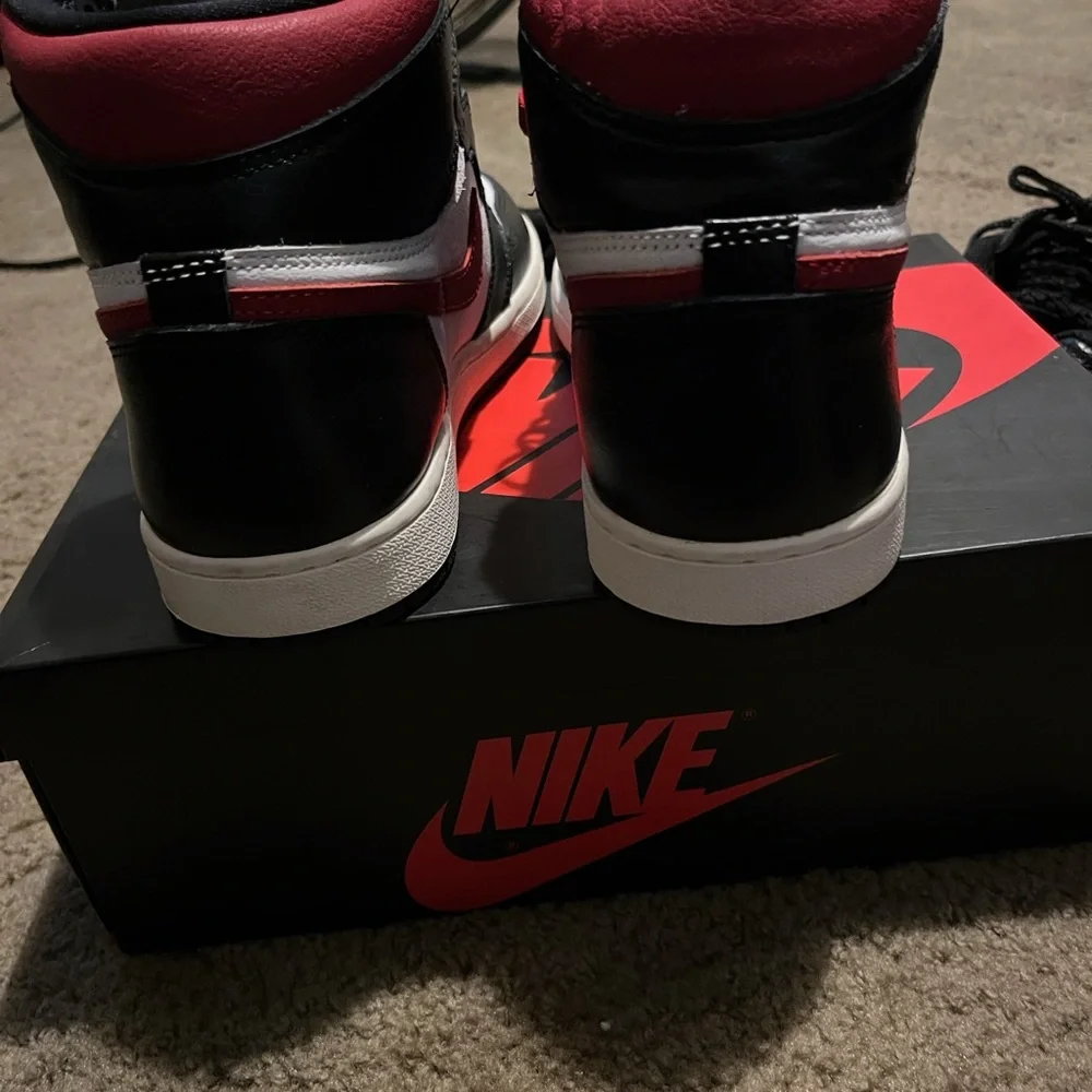 Jordan High-Top Sneakers in Black, White & Red